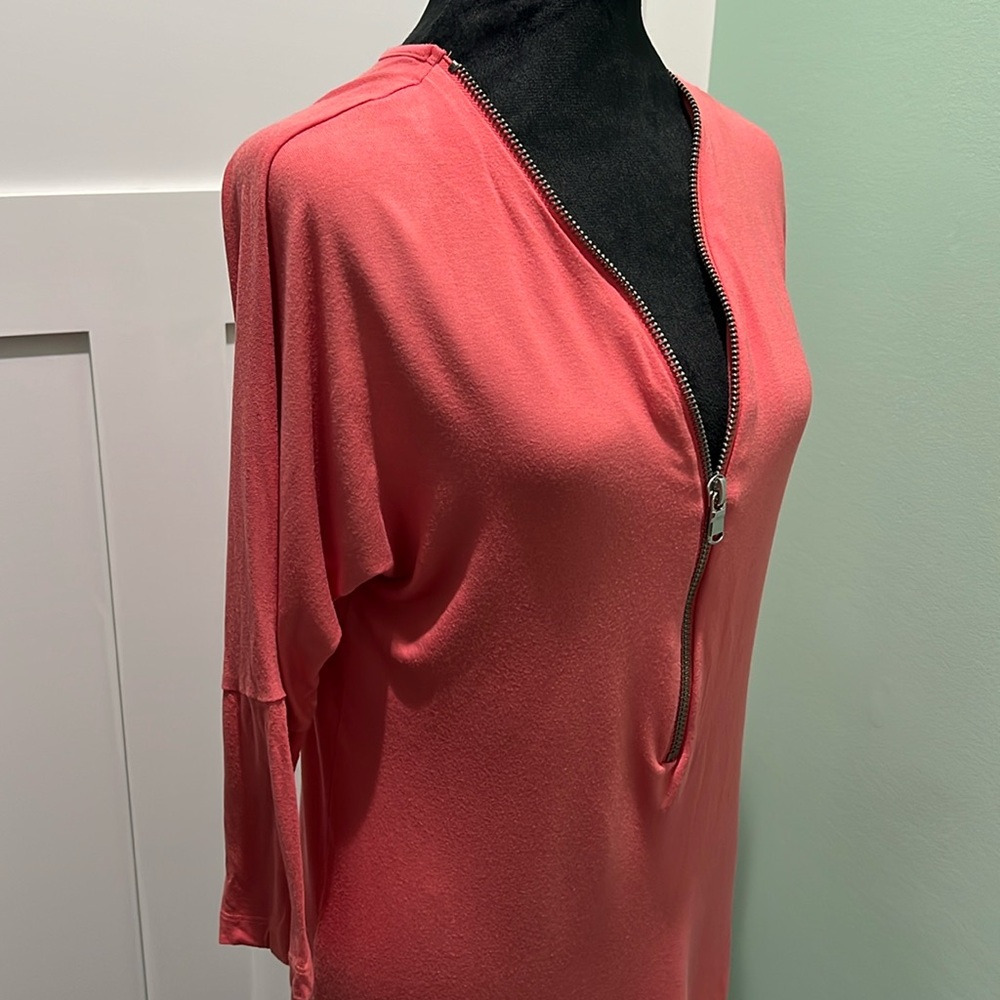 Venus women’s top. Size medium. Coral color with silver zip front.